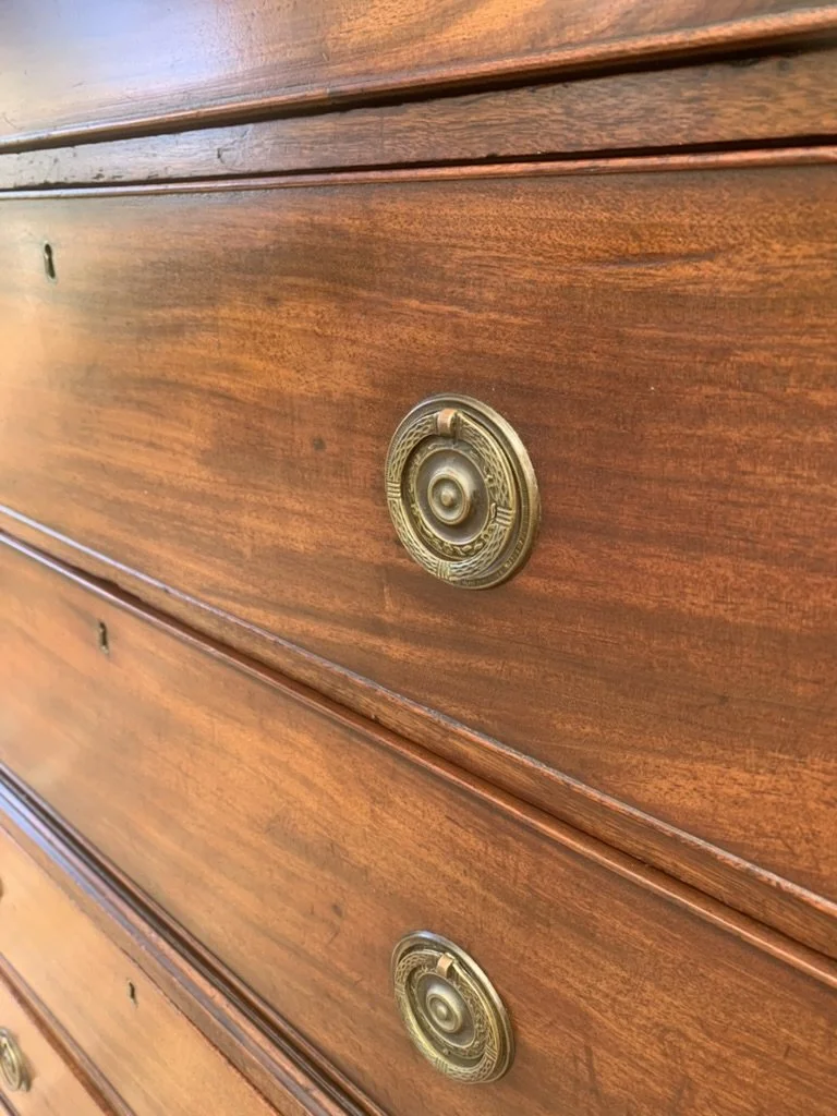 Stamped brass ring handle, period-style replacement hardware on Georgian mahogany chest on chest tallboy, C.1790-1810