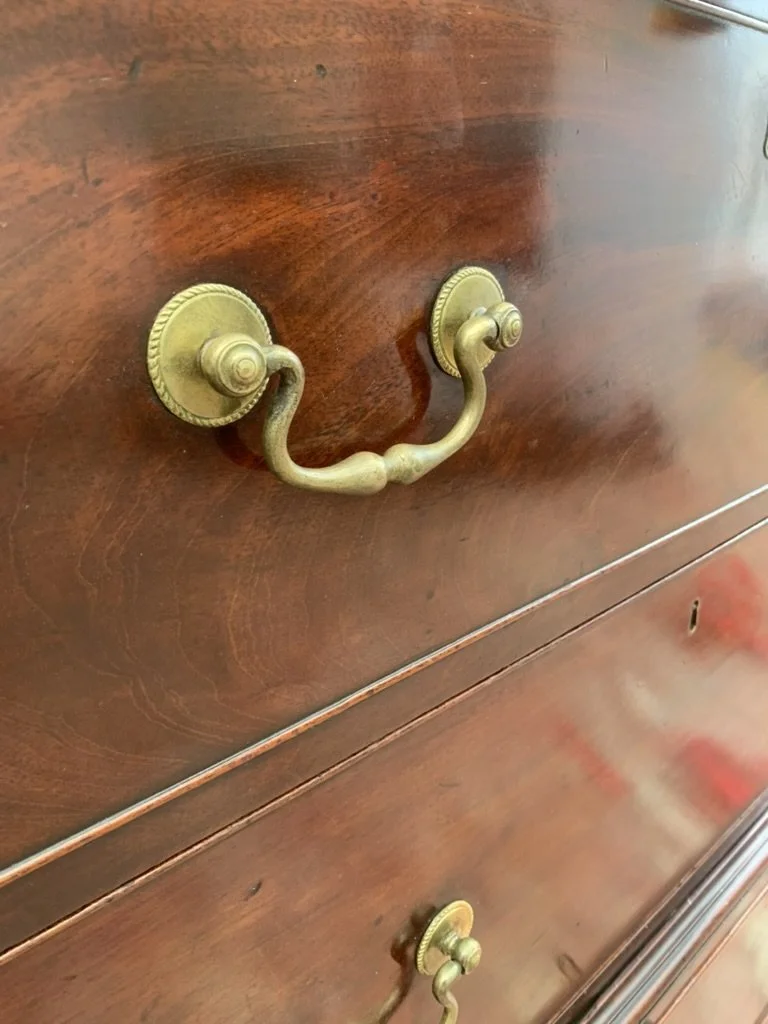 Close-up original brass drop handle, Georgian mahogany chest of drawers