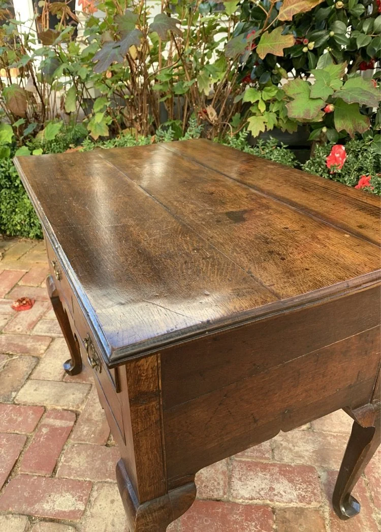 Georgian oak lowboy c.1730–1750, three-plank solid oak top with period patina — top surface detail