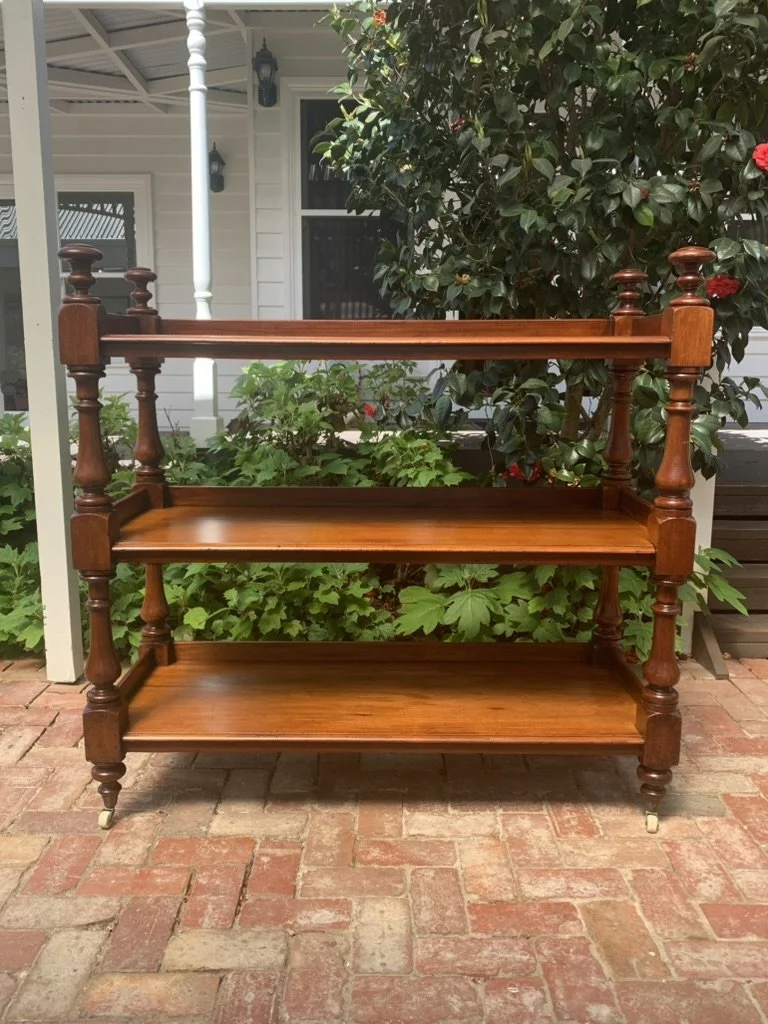 Australian Colonial cedar dumb waiter C.1870, three-tier antique buffet, turned columns, porcelain castors, Victorian serving stand