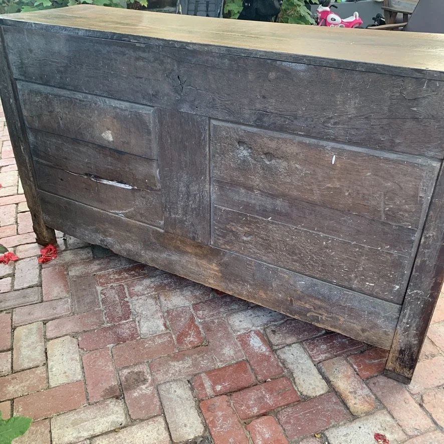 Reverse of French oak enfilade buffet showing period plank construction and historic surface patina