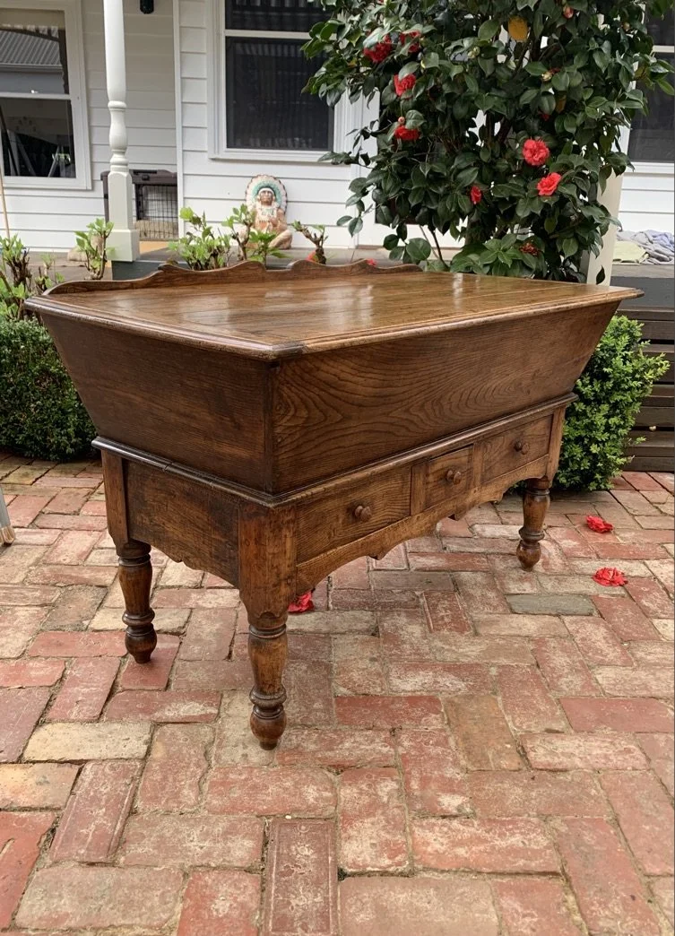 Antique French poplar and cherry dough bin, c.1840, turned legs and three-drawer farmhouse base