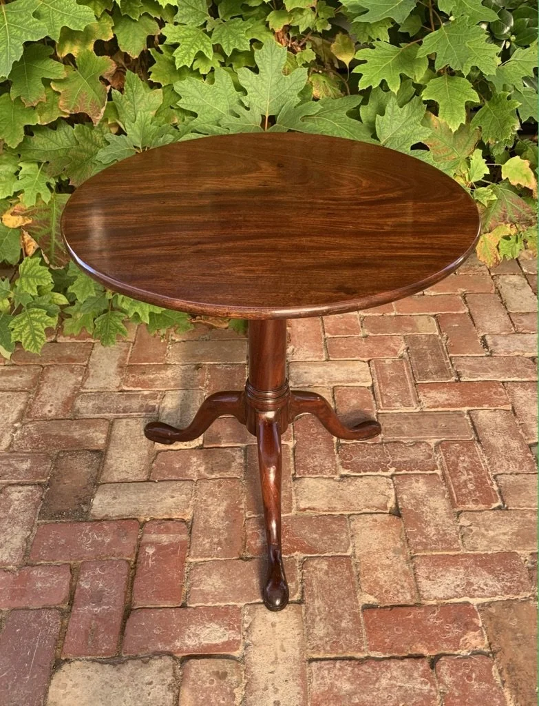George III mahogany tilt-top wine table, circular top, turned column, swept tripod base with cabriole legs with pad feet, circa 1770-1790