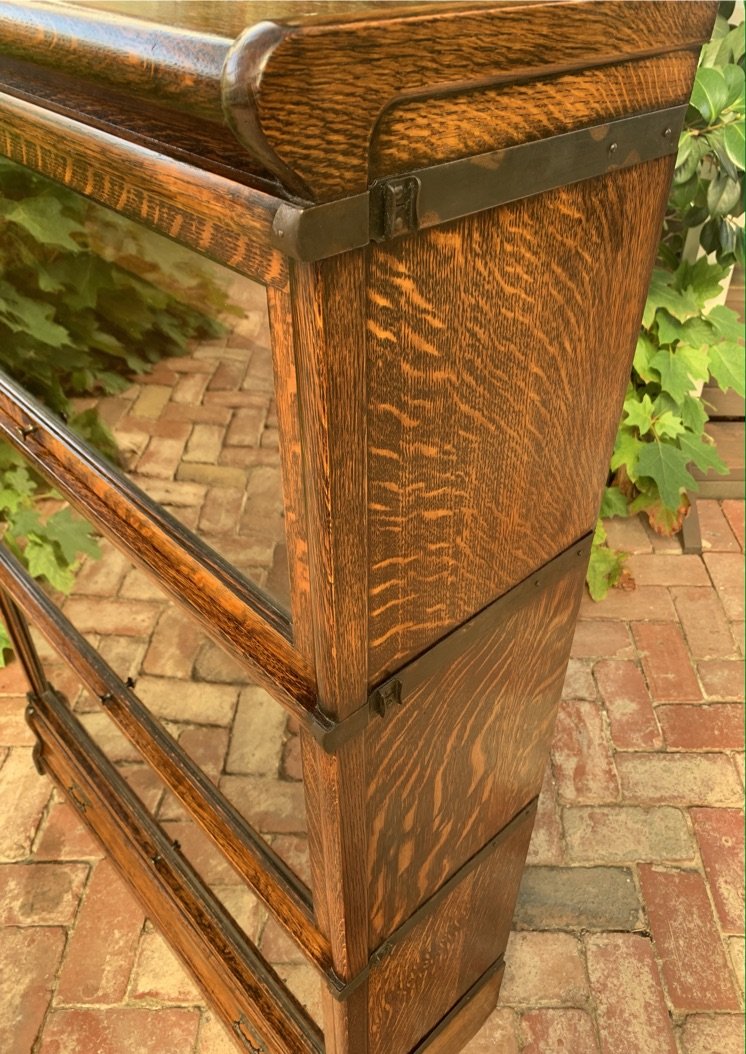 Antique Globe Wernicke stacking bookcase quartersawn oak side view original metal section clips c.1910
