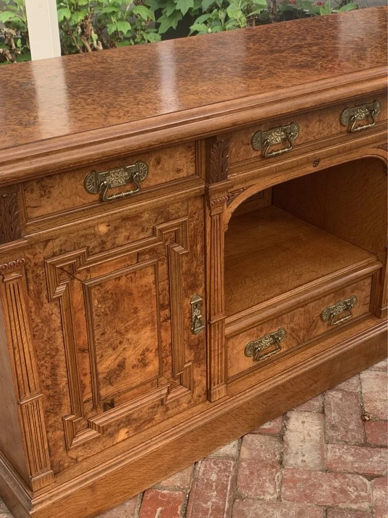 Victorian pollard oak sideboard front detail c.1890, central arched recess, reeded pilasters, brass drop handles, figured door panels
