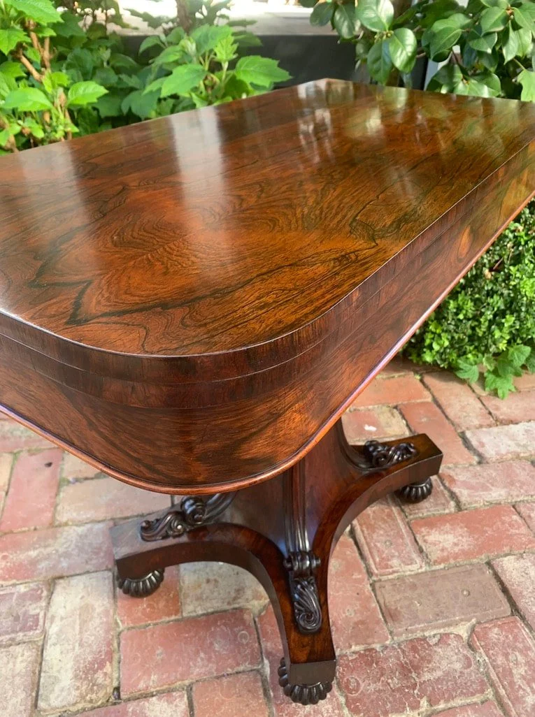 William IV rosewood card table C.1835, figured rosewood veneer fold-over swivel top with rounded corners, antique games table
