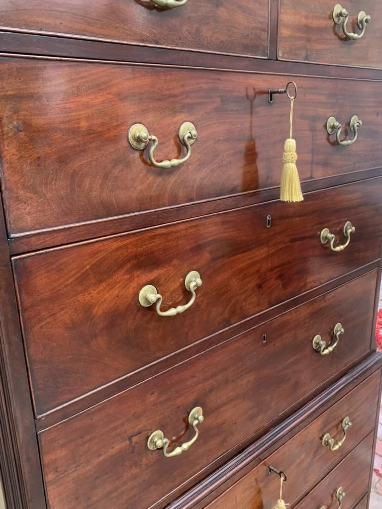 Original brass swan-neck handles on George III mahogany chest-on-chest