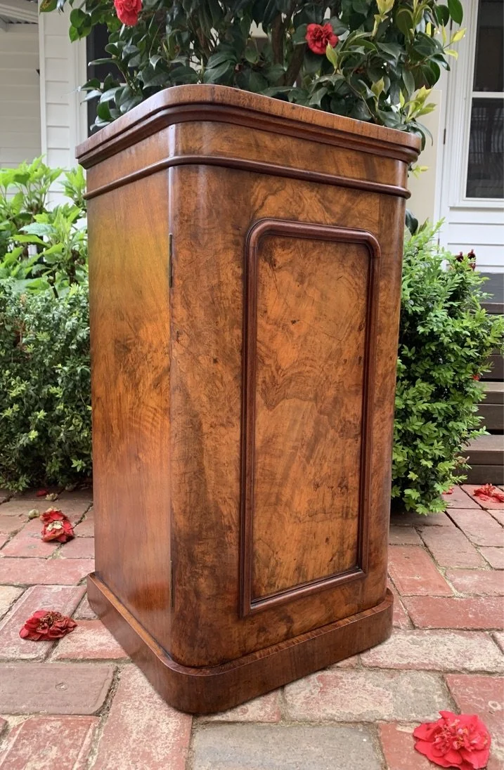 Victorian burr walnut pot cupboard used as antique bedside table or nightstand, canted corner detail