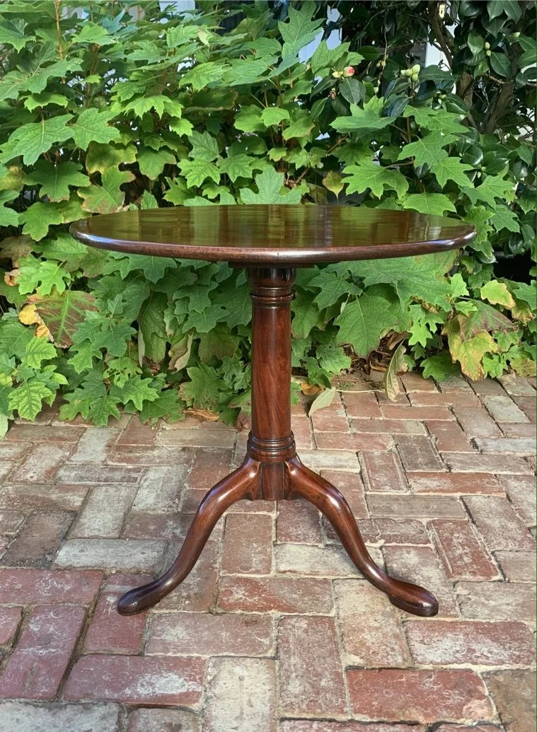 George III mahogany tilt-top wine table, circular top, turned column, swept tripod base with cabriole legs with pad feet, circa 1770-1790