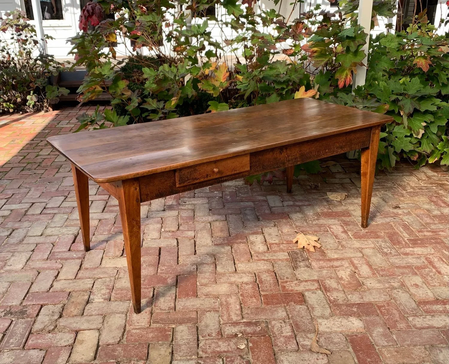 Antique French cherry wood farmhouse table with drawer, oak frame, tapered legs, circa 1840