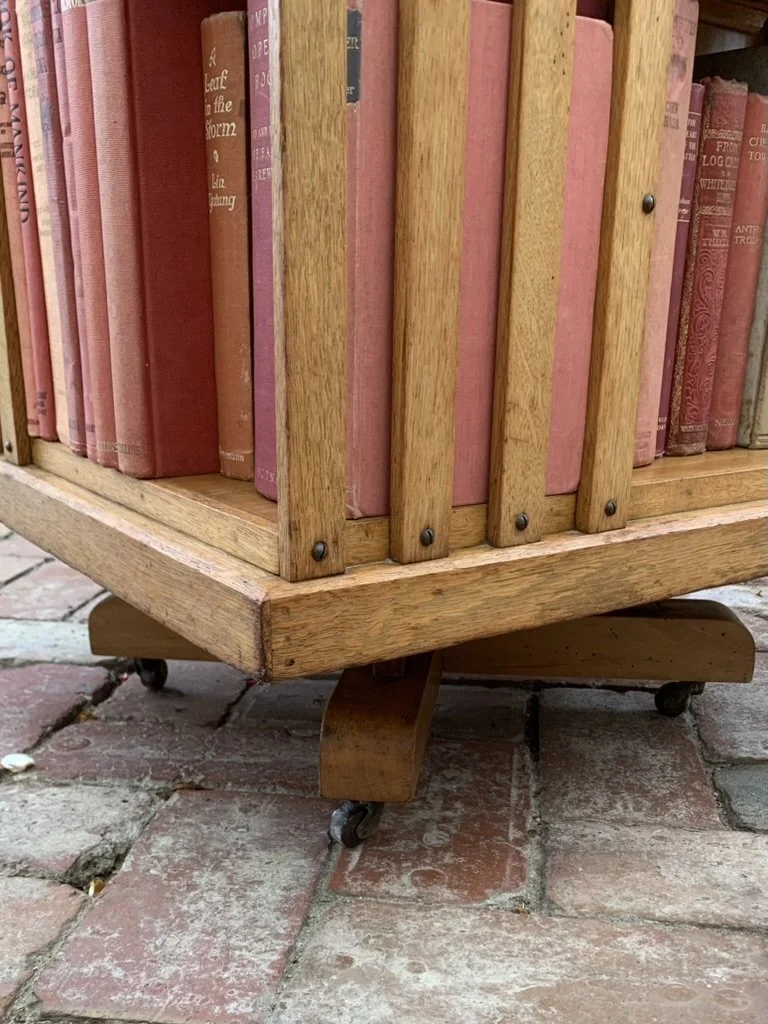 Detail of oak revolving bookcase base, castors and quad base, Edwardian library furniture