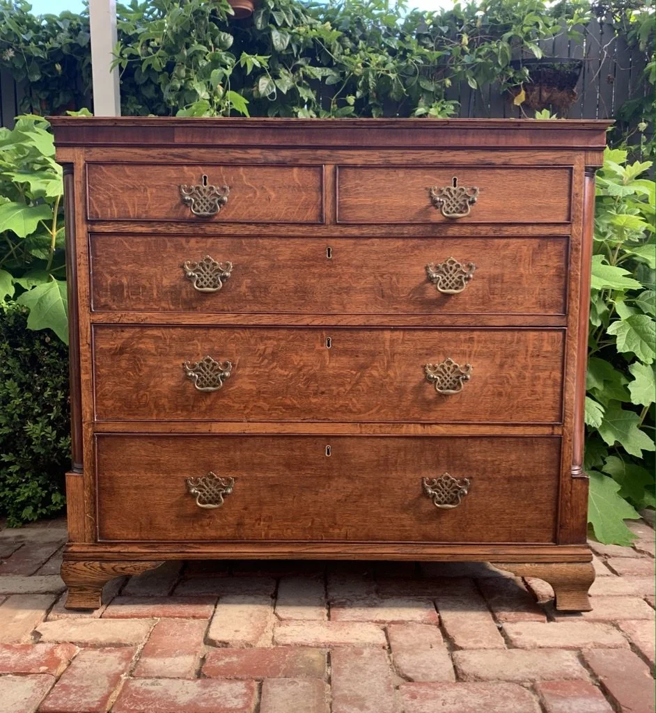 Georgian oak chest of drawers c.1790 figured drawer fronts mahogany quarter-columns bracket feet brass fretwork handles