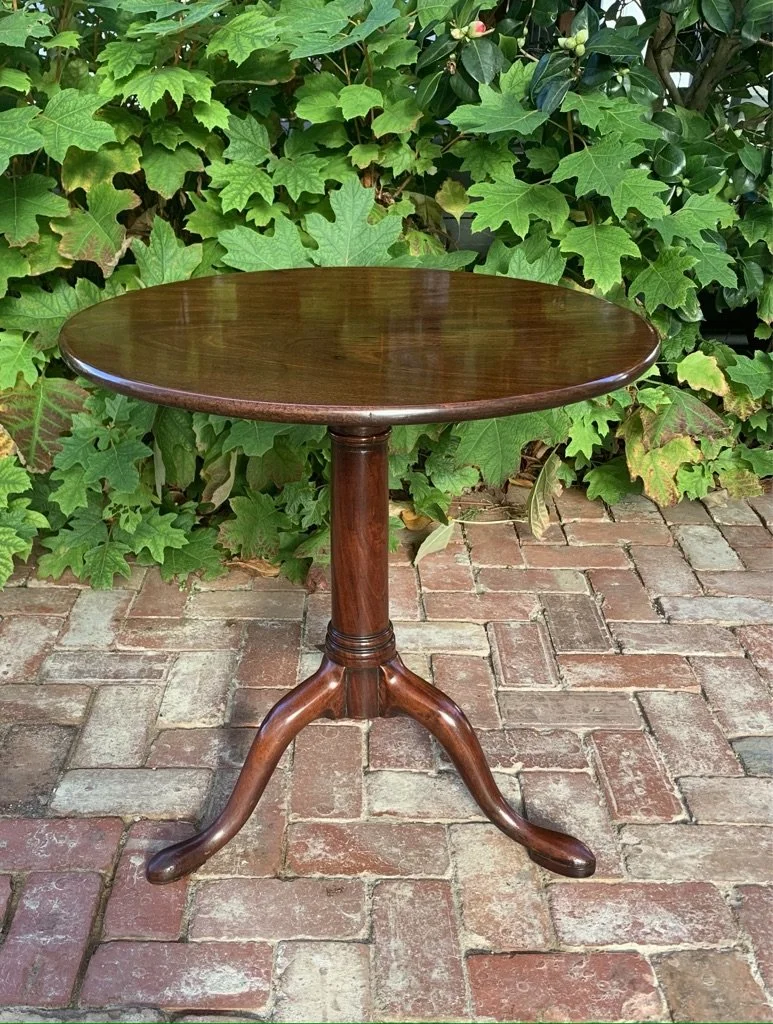 George III mahogany tilt-top wine table, circular top, turned column, swept tripod base with cabriole legs with pad feet, circa 1770-1790