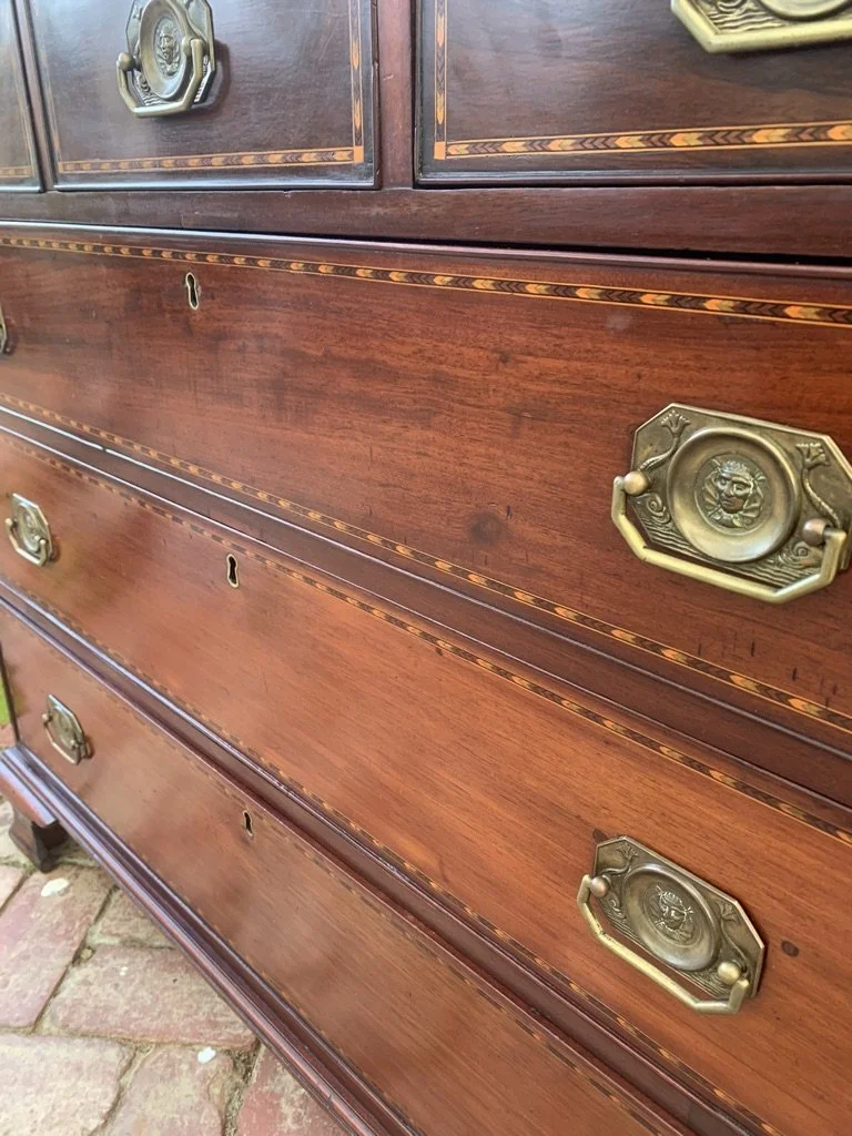 close up of brass plate swing handles
