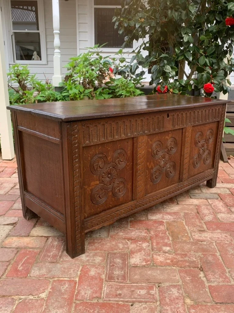 Antique English oak coffer C.1680-1720, three panel carved blanket chest with carved roundels, stile feet, waxed finish