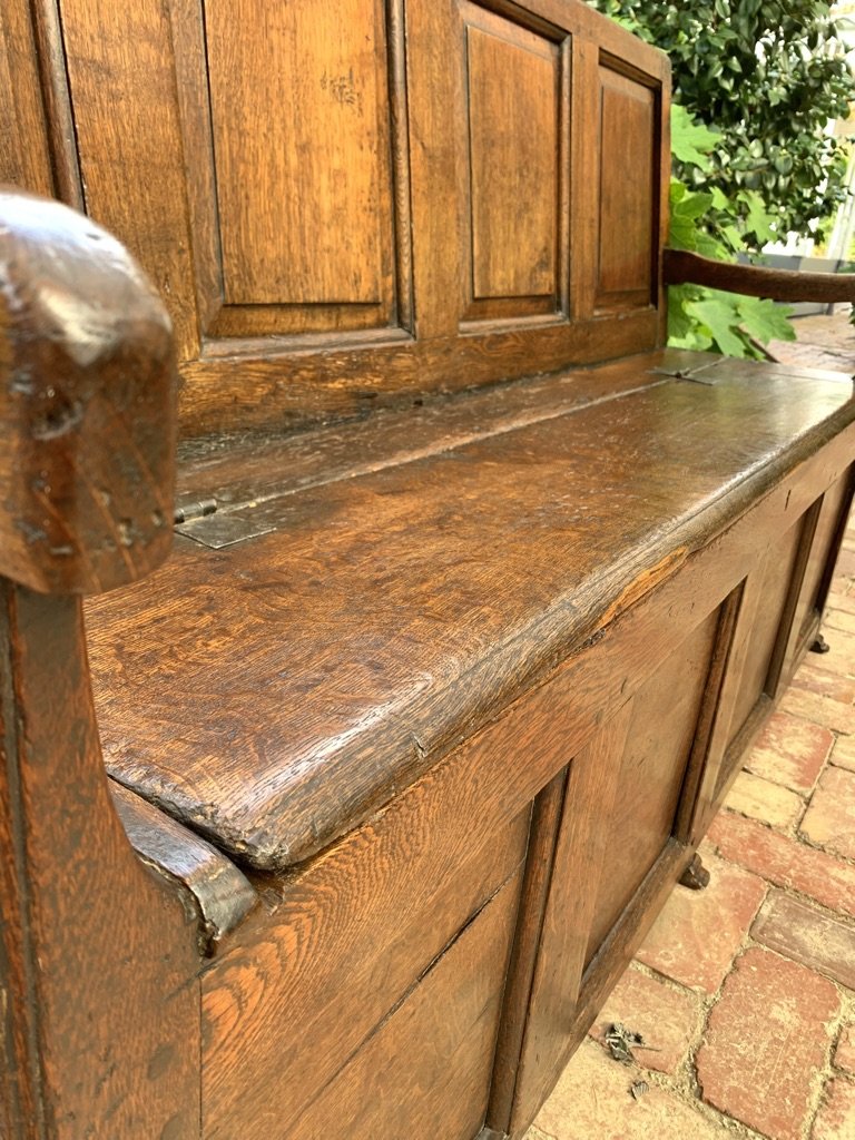 Lift-up seat with original hand-wrought iron hinges antique English oak box settle