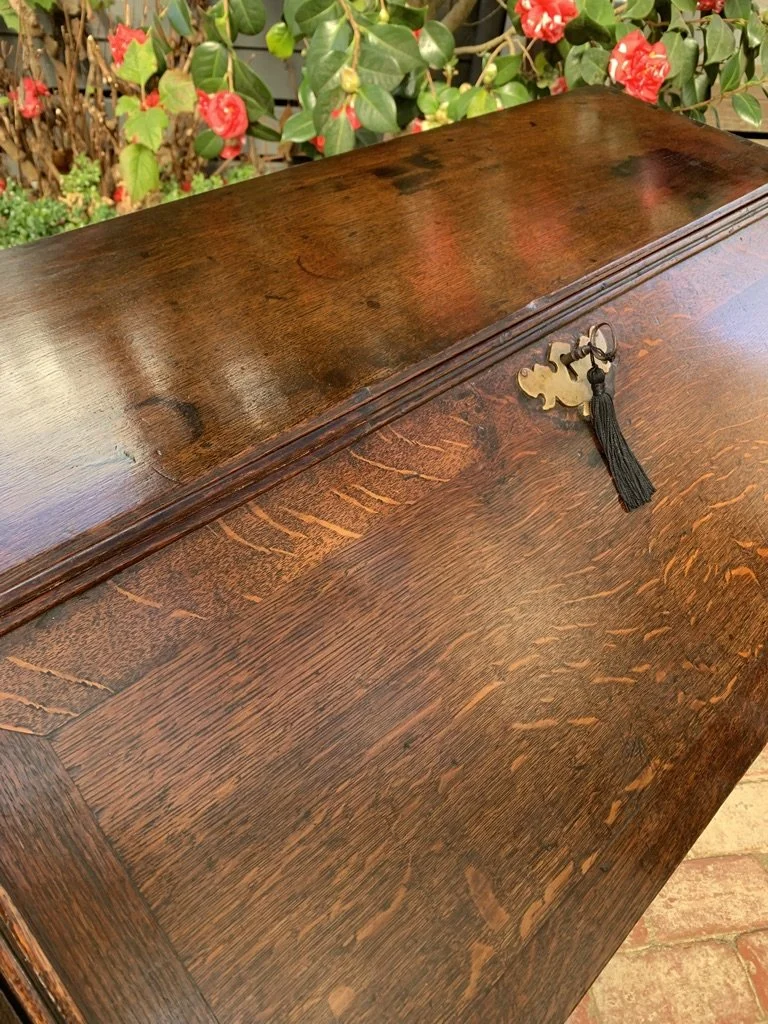 close up of fall front and brass escutcheon