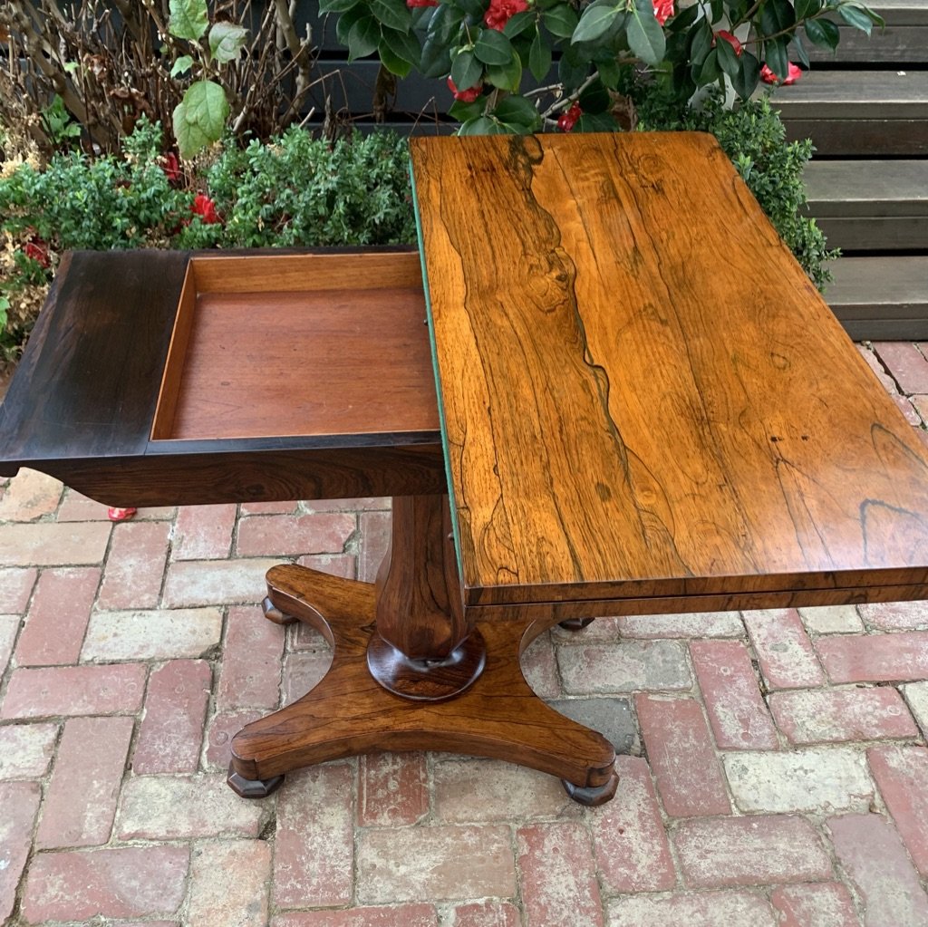 william iv rosewood card table with top turned to show hidden well for card storage