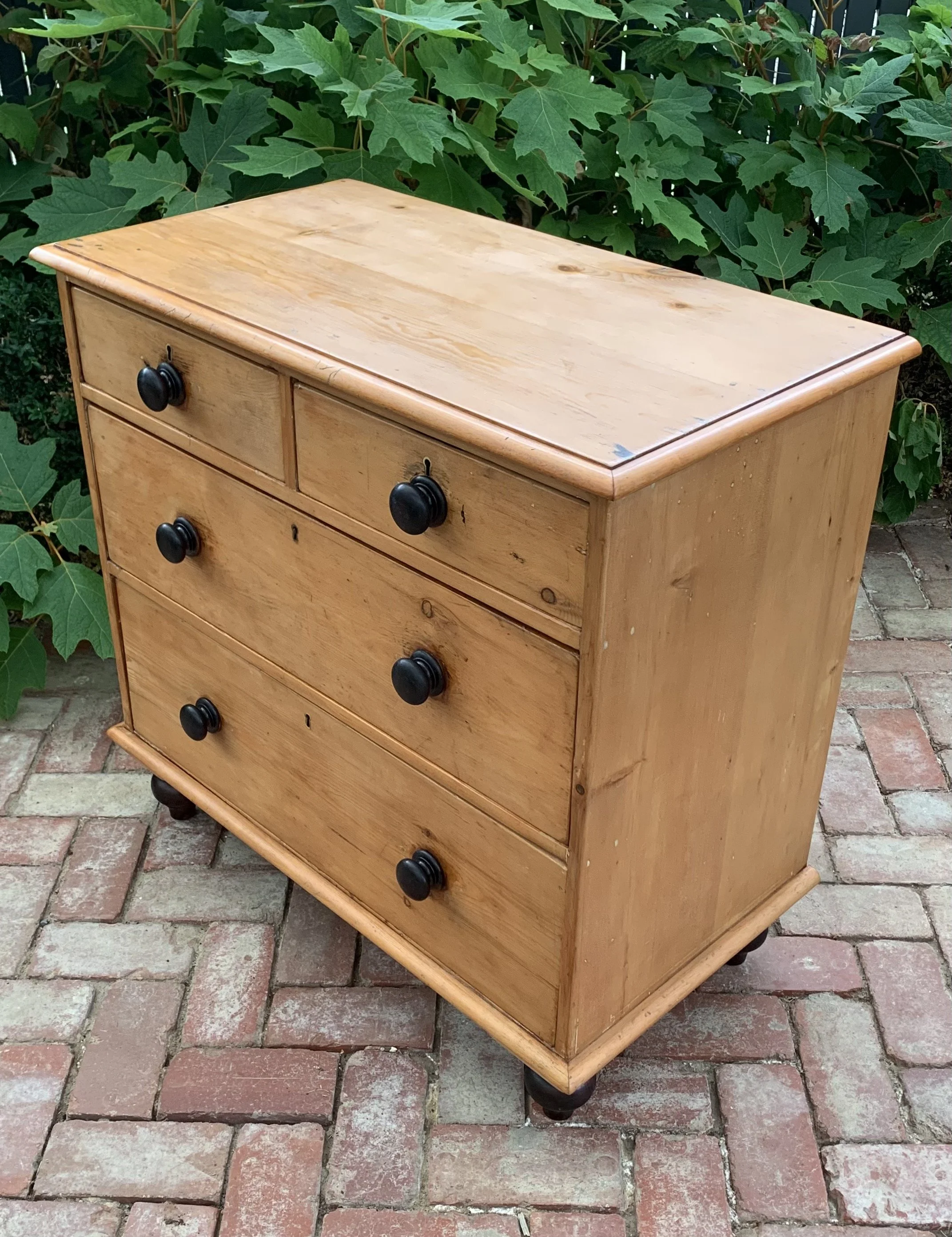 Antique victorian pine chest of drawers angled view
