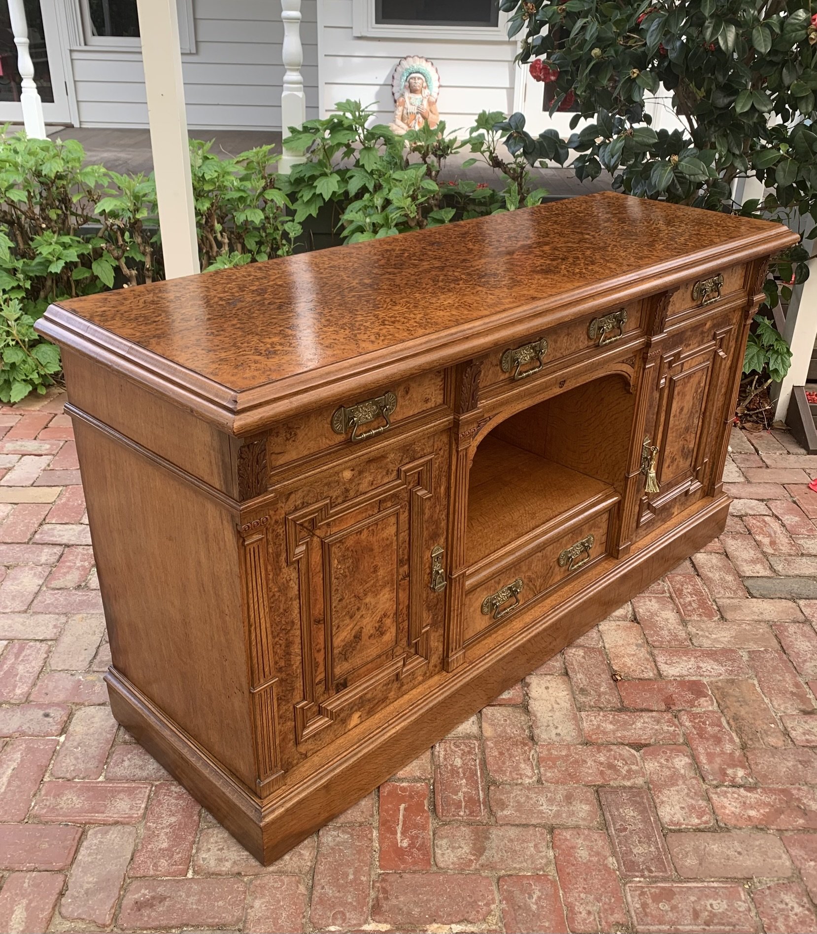Victorian pollard oak sideboard c.1890, figured veneer top, reeded pilasters, brass drop handles, central arched recess, England