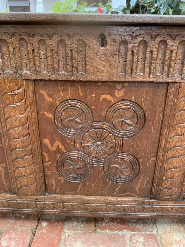 Carved rosette panel on C.1680-1720 antique oak coffer, arcaded frieze, gouge carved stile, 17th century oak chest