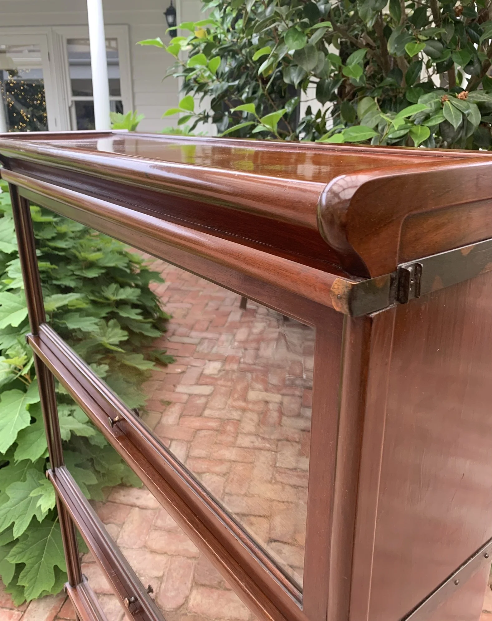Polished mahogany molded top section of antique bookcase