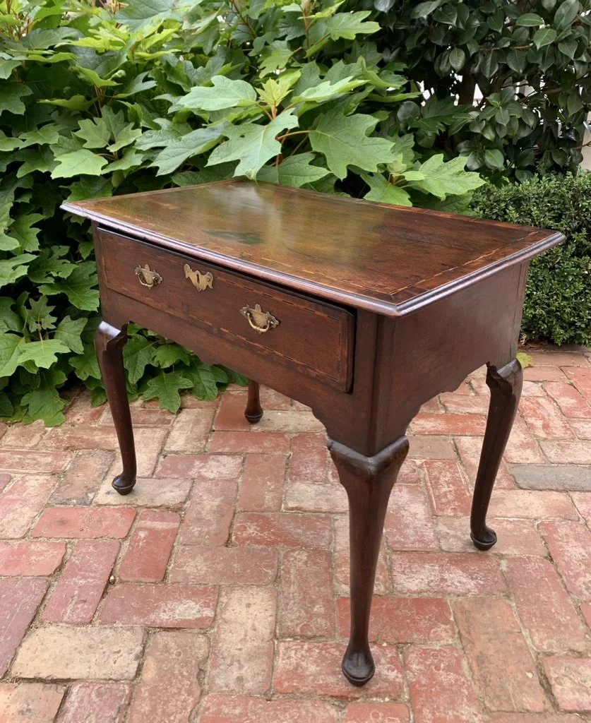 angled view of georgian oak side table or low boy c.1760