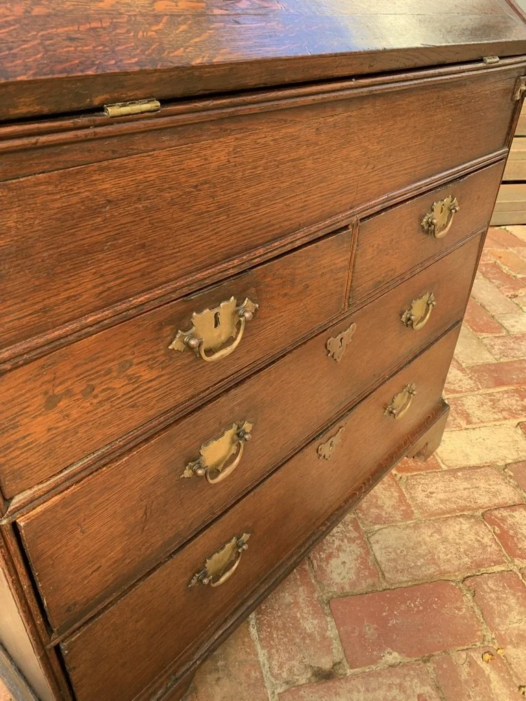 close up of drawer fronts and period brass hardware