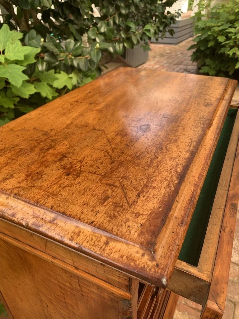 Victorian collector's cabinet top surface detail, figured satin walnut veneer with aged patina, 19th century