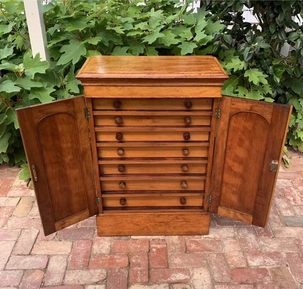 19th century cedar satin walnut collector's cabinet both doors open, seven fitted drawers, plinth base