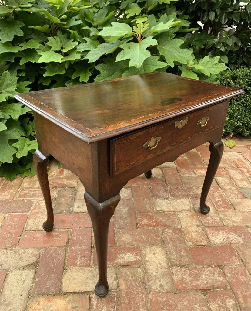 Georgian oak side table or low boy with a single drawer and cross banded and inlaid top with cabriole legs