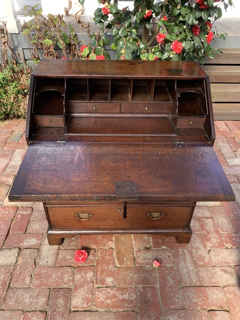 Opened view of Georgian Oak Bureau with sliding well