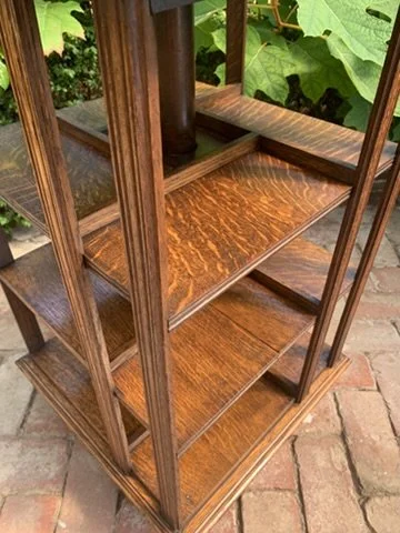 Detail of quartersawn oak shelves and reeded corner uprights, Edwardian revolving bookcase c.1910