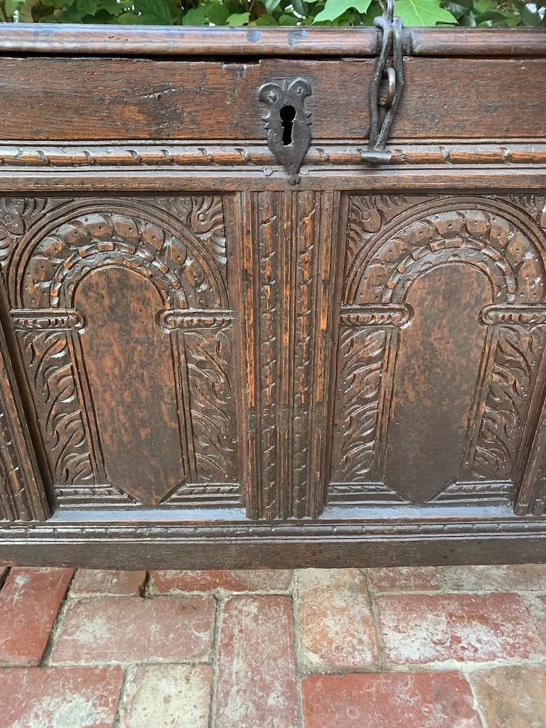 17th-century oak coffer carved blind arch panels acanthus foliage iron escutcheon hasp detail c.1660
