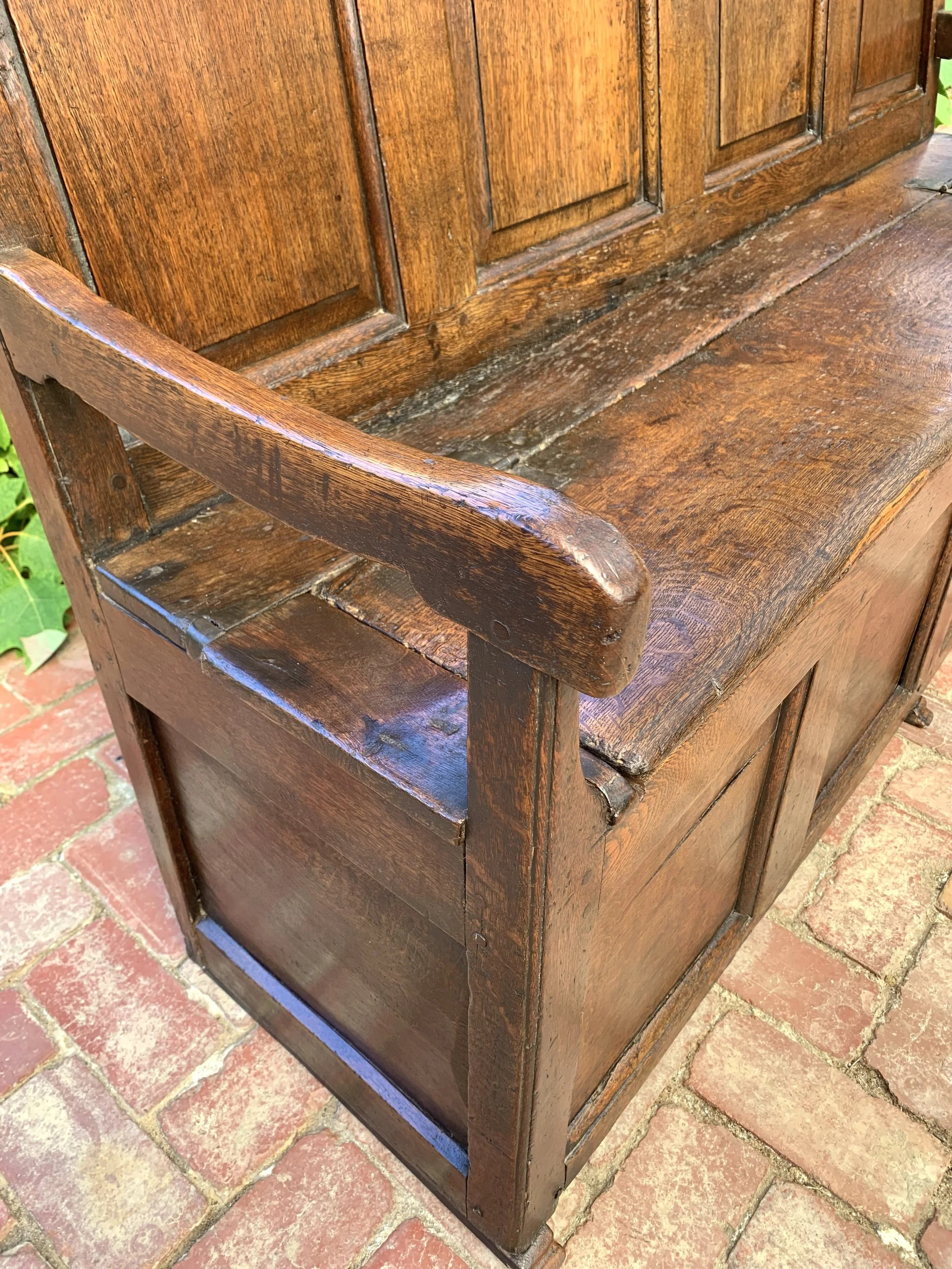 Welsh oak box settle c.1720 close up view of arm rest