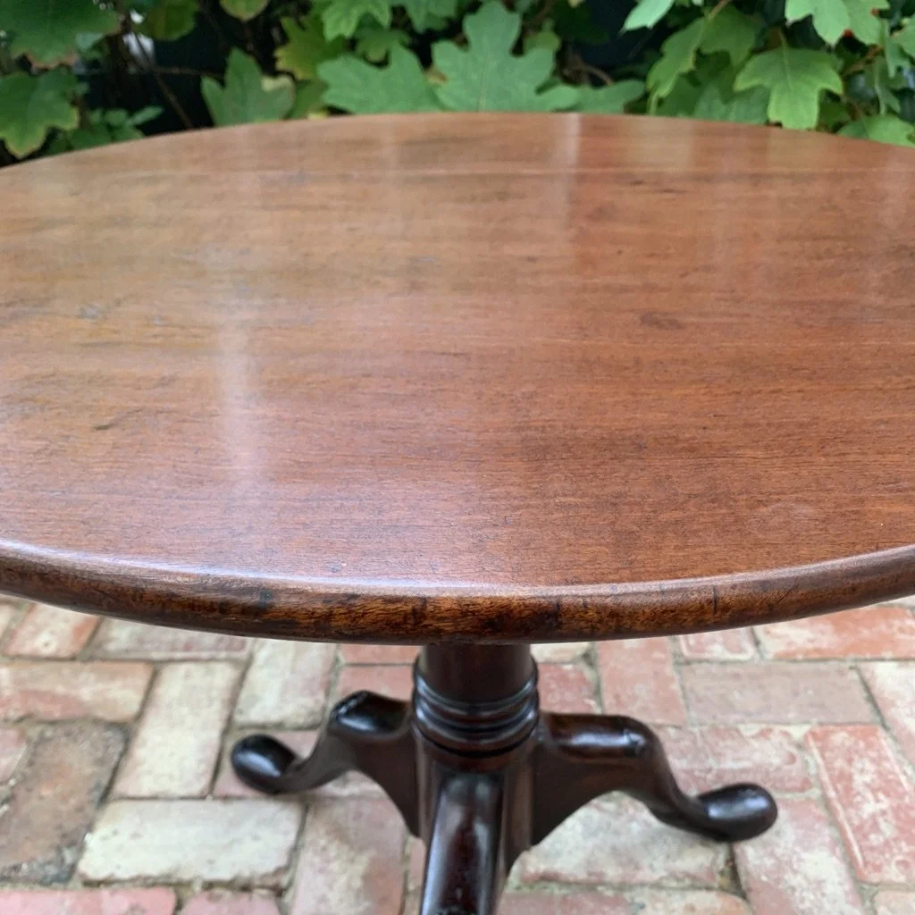 Antique mahogany table edge detail with moulding and patina
