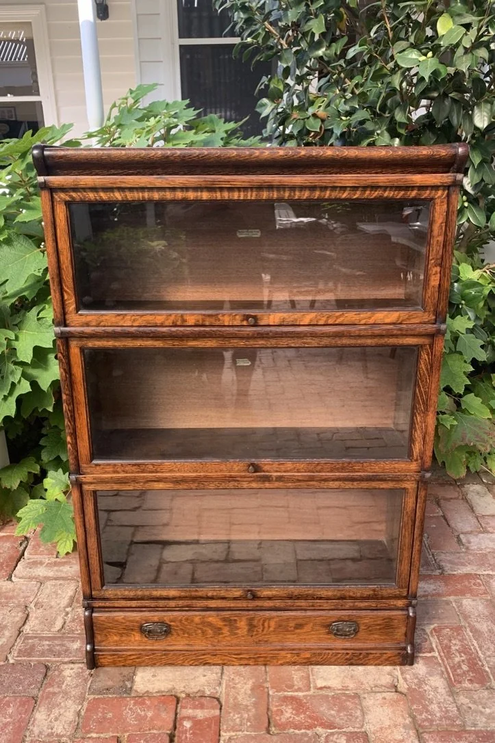 Globe Wernicke quartersawn oak stacking bookcase three sections base drawer original brass handles English Edwardian c.1910