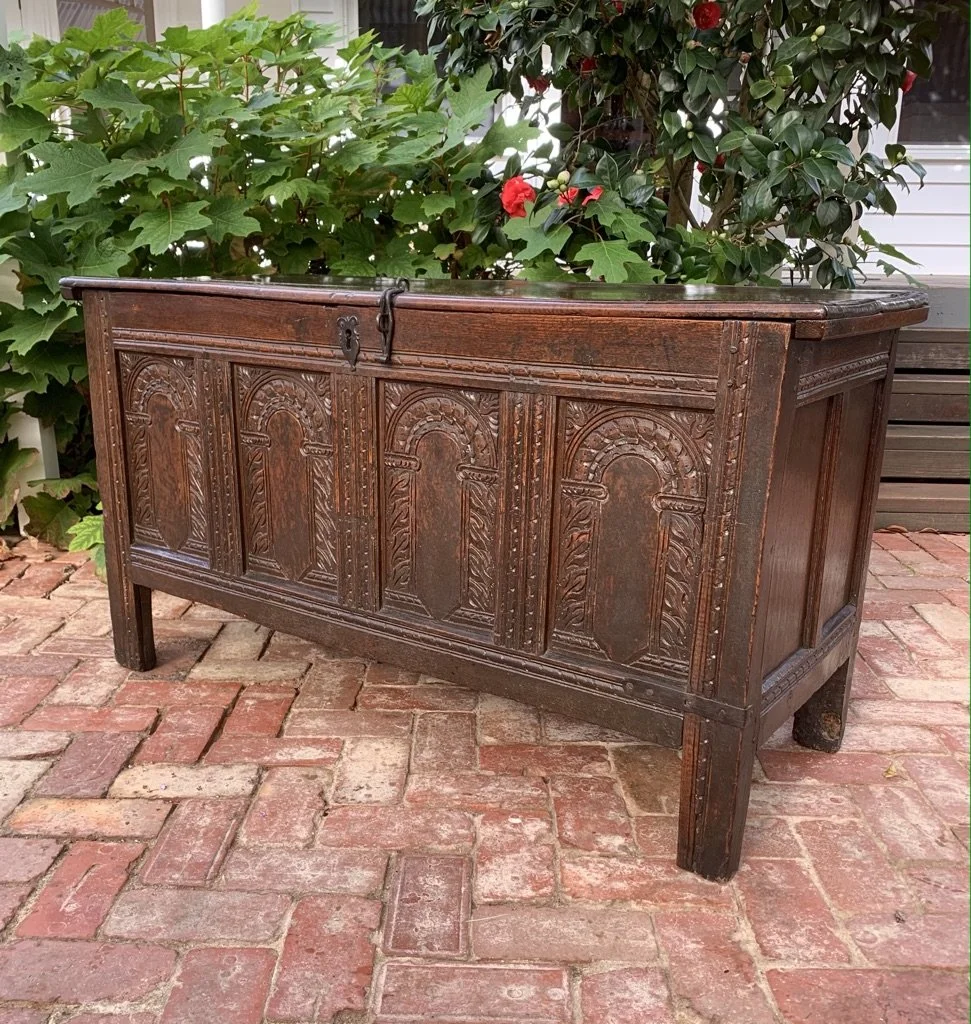 English vernacular oak coffer c.1660 right three-quarter carved arcaded panels plain end patina age