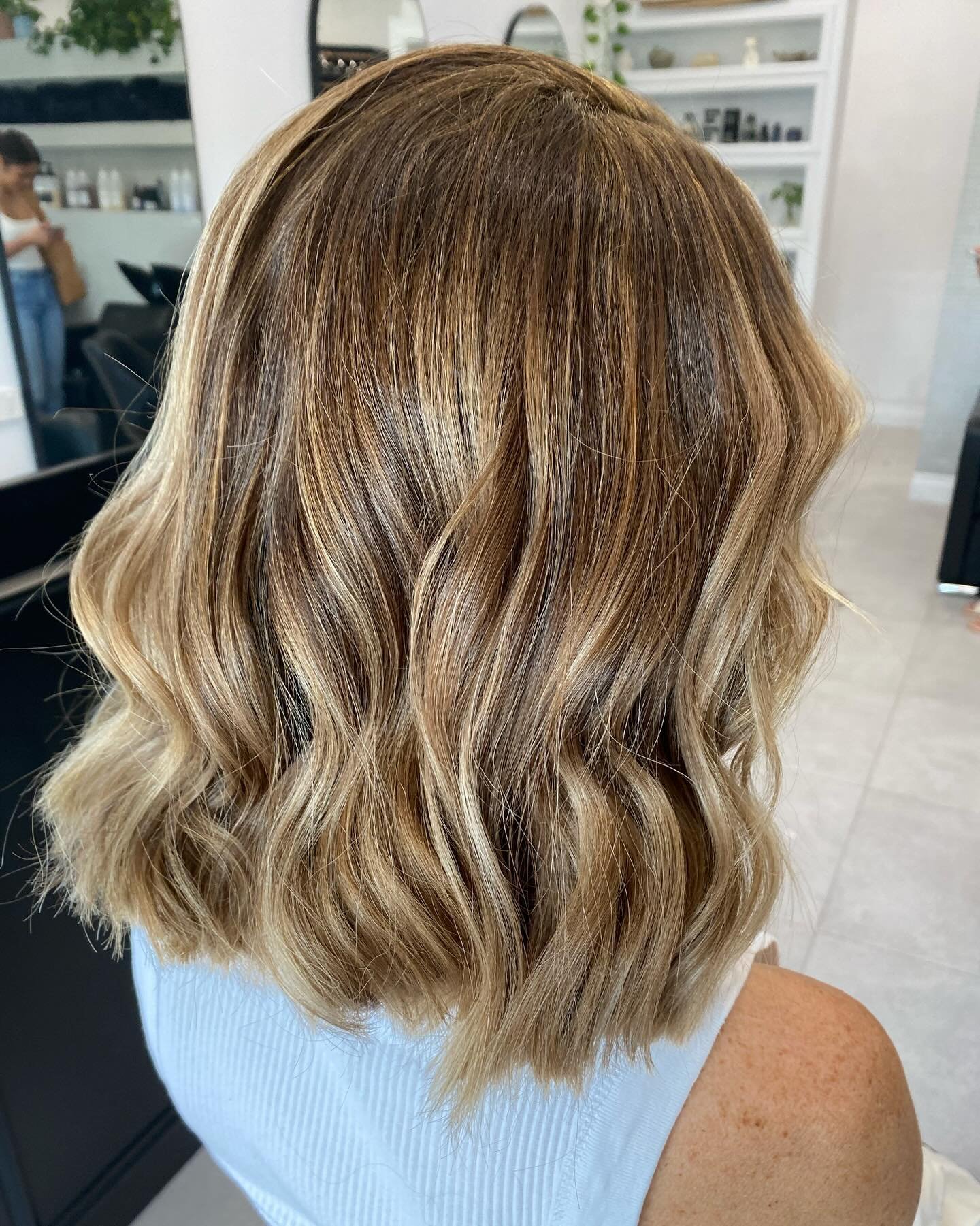 Creating dimension by adding low lights through your existing lighter ends, results in a much softer/natural look! 

This one is on one of our beautiful regulars -  by Lilly 💥