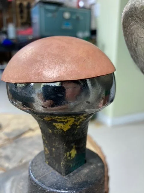Forming copper over mushroom stake