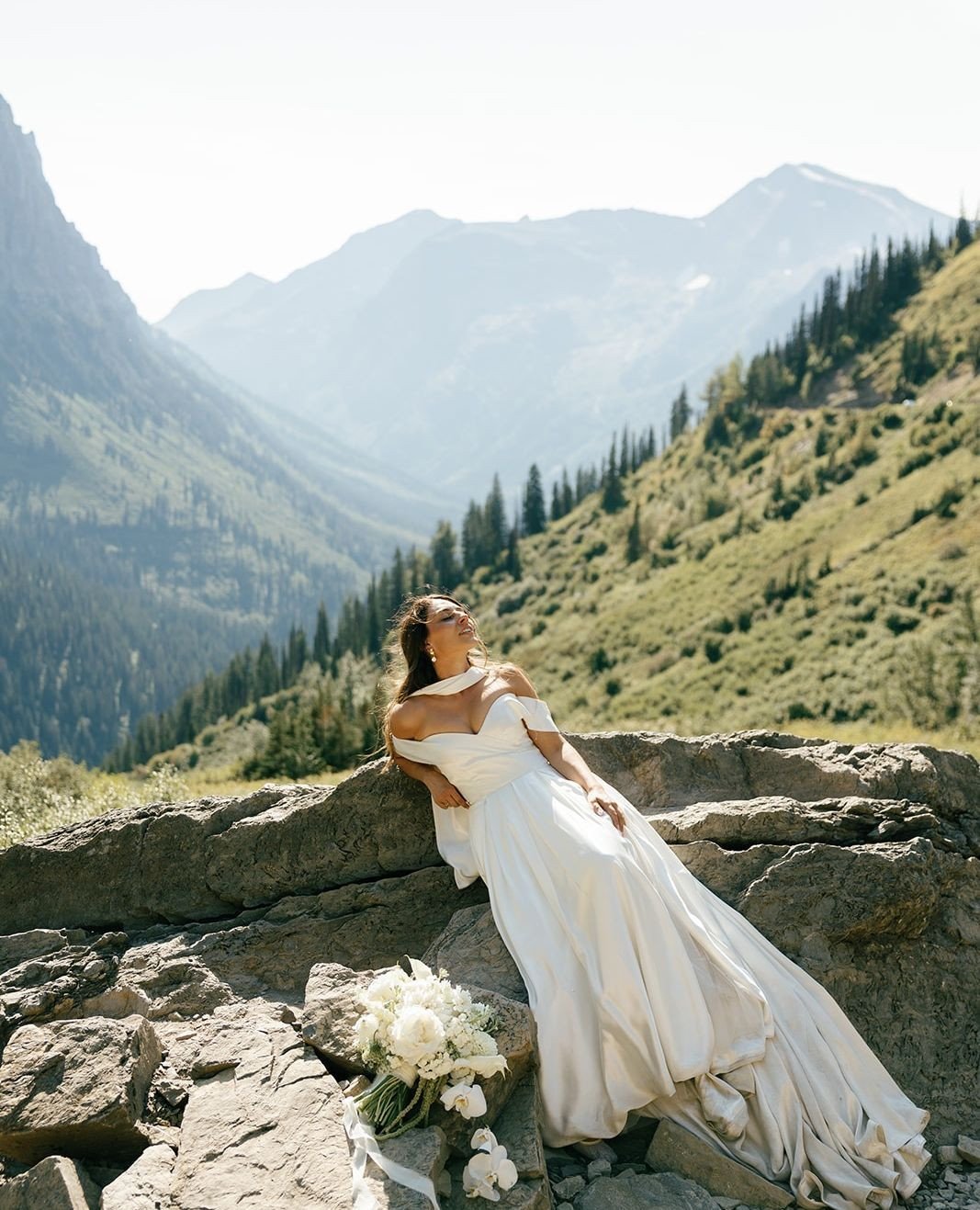 A glimpse into Julia&rsquo;s day. A vision in @willowandwinterbridal⁠
⁠
Bride: @jules_kimberly⁠
Captured by: @luviaphotoandfilm⁠
Venue: @dogcreeklodge⁠
Hair: @theblond406⁠
Bouquet: @rockinbarc⁠
Event planner: @theblairecollective⁠
Design code: CZ2270