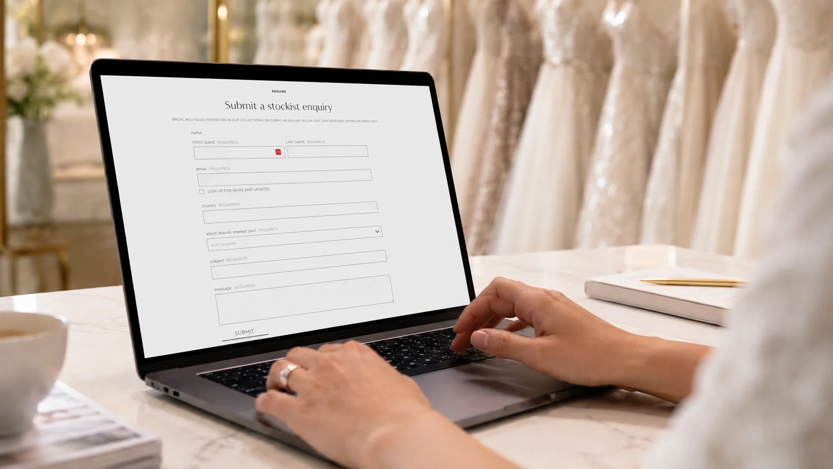 Boutique owner completing a wholesale enquiry online