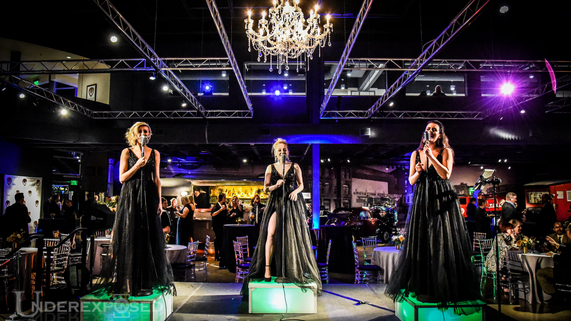 Low light event photography at a Denver corporate event in downtown hotel ballroom