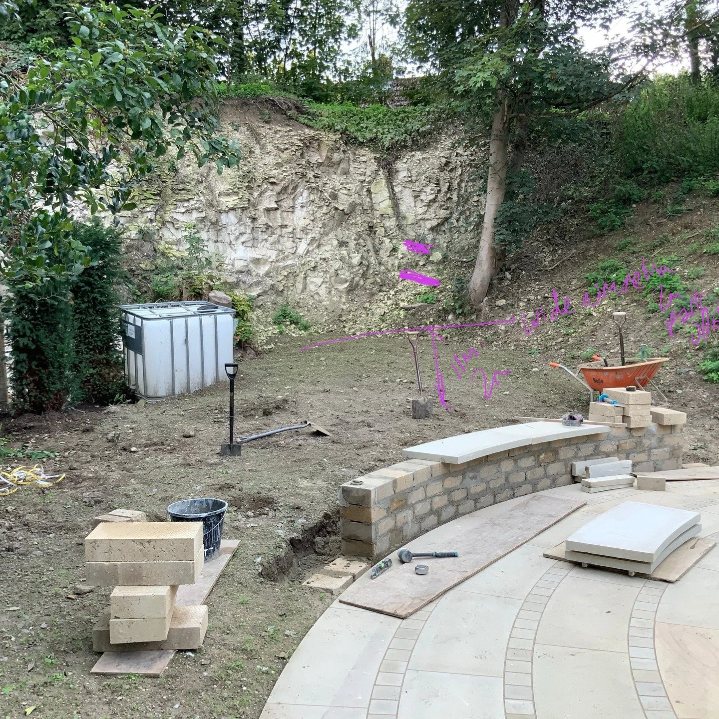 On site - testing position &amp; scale with spades &amp; measuring tape before a trip to the nursery to source specimen trees &amp; shrubs. 

The stone terraces &amp; walls are mid build &amp; we can see the character of each area of the garden start