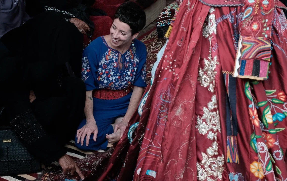 Kirstie Macleod_with FanSina embroiderers, Sinai_Photo_Georgina_Sleap.jpg
