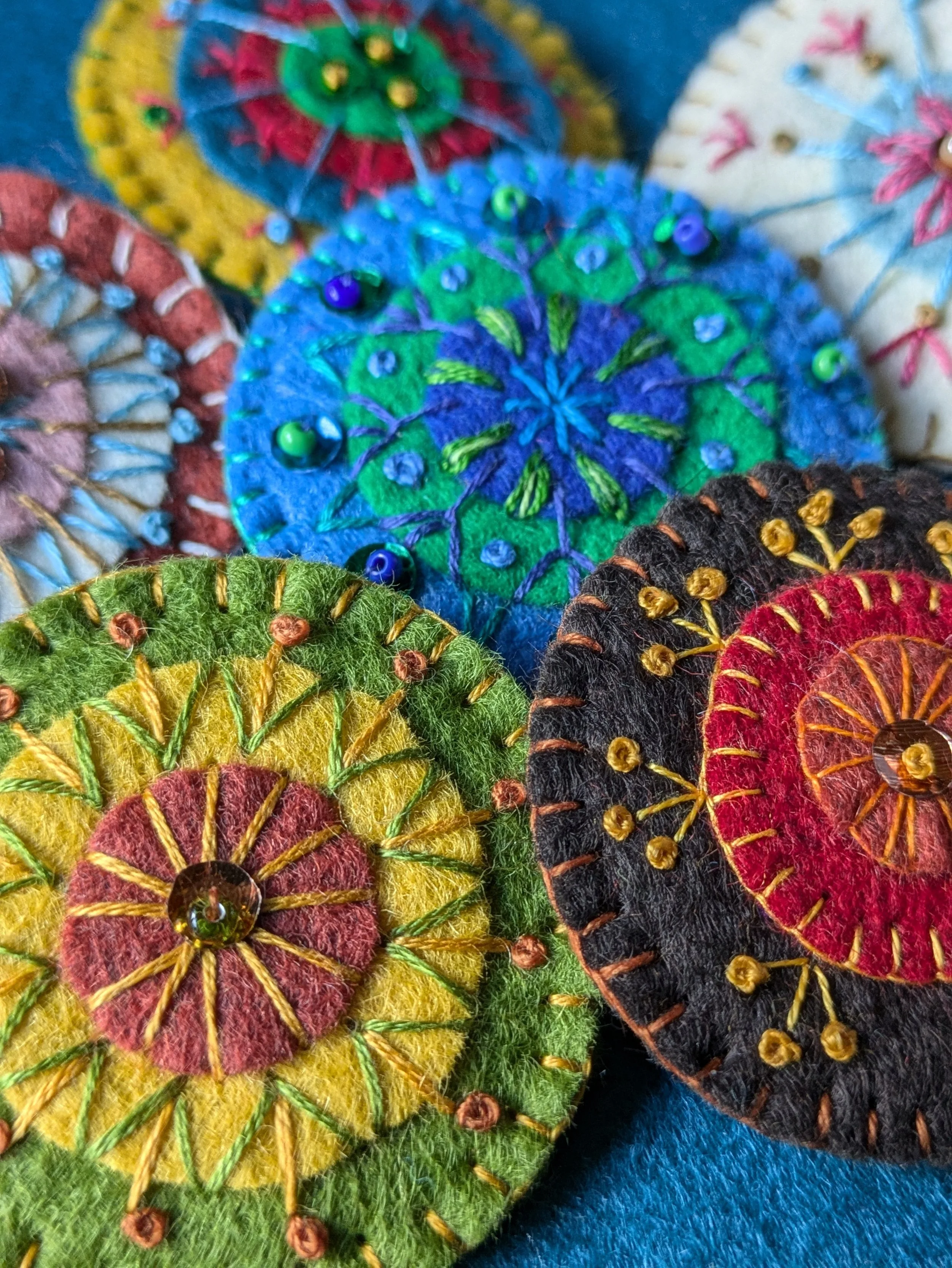 Multi mandalas on blue.jpg