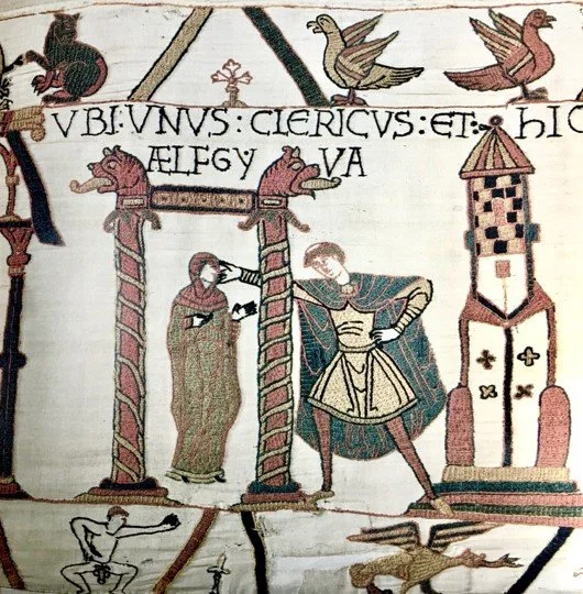 Bayeux Tapestry- Aelfgyva priest touching cheek, naked man may be scandal with lady.jpeg