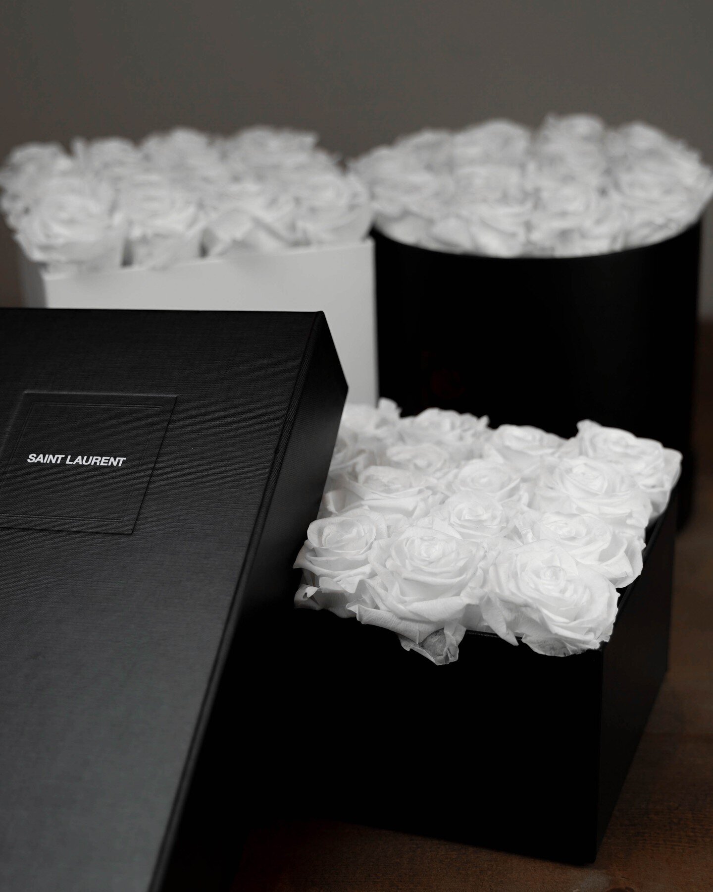 Arranged for Will T. 12.05.21
&mdash;
Featured is a customer&rsquo;s YSL shoe box sent in for a white perpetual roses arrangement, repurposed for a gift.
&mdash;
Box Dimensions: 12&rdquo; W x 6.75&rdquo; L x 4.25&rdquo; H
Total Roses: 28

#madamrose 