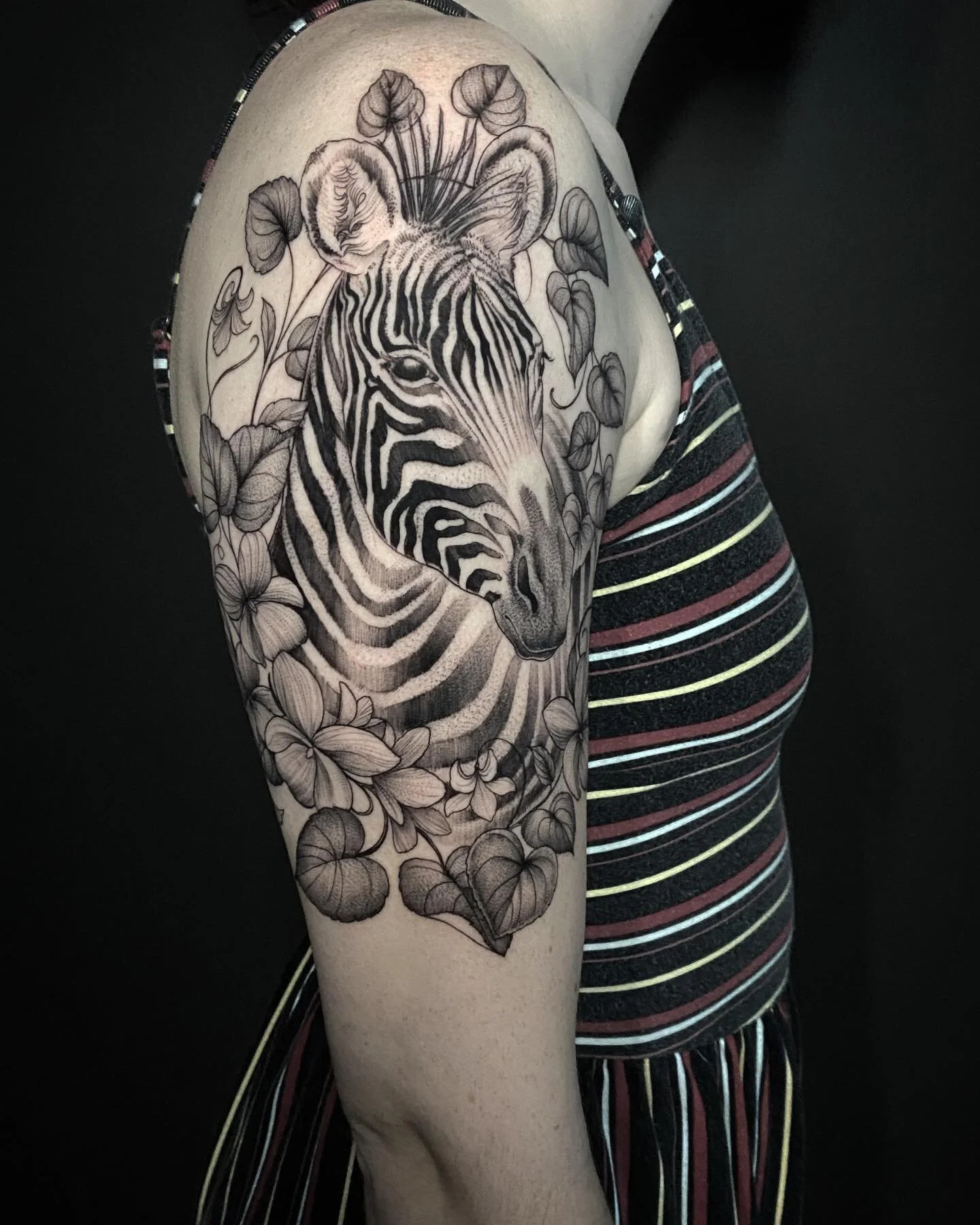 Abra the Gr&eacute;vy zebra. A two year old Zebra from Lincoln Park Zoo whom just made a big move to Disney! 

.
.
.
#zebra #zebratattoo #tattoo #tattoos #flowers #zebrandflowers #violet #violets #violetflowers #armtattoo #oneshottattoo #blackwork #d