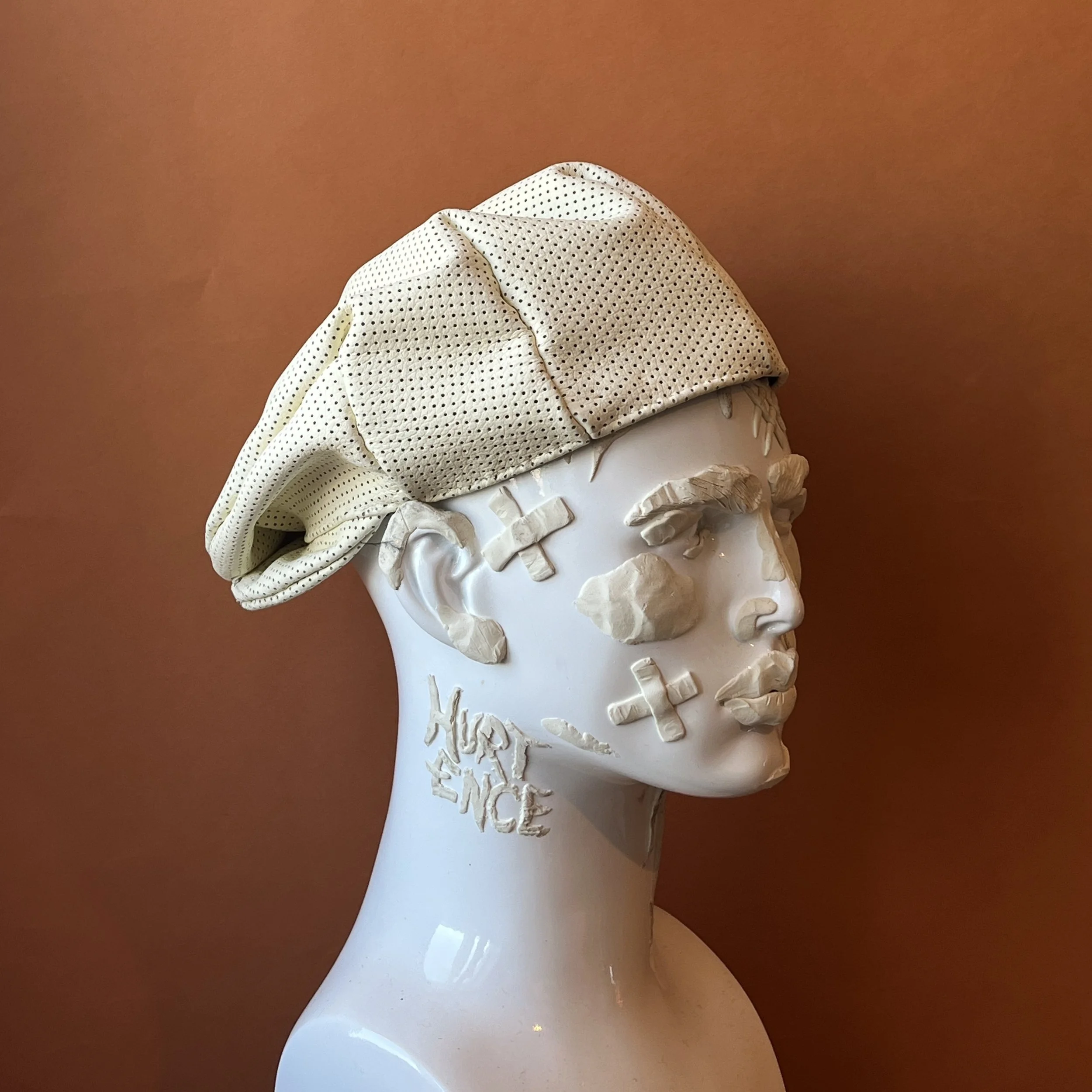 white leather flatcap